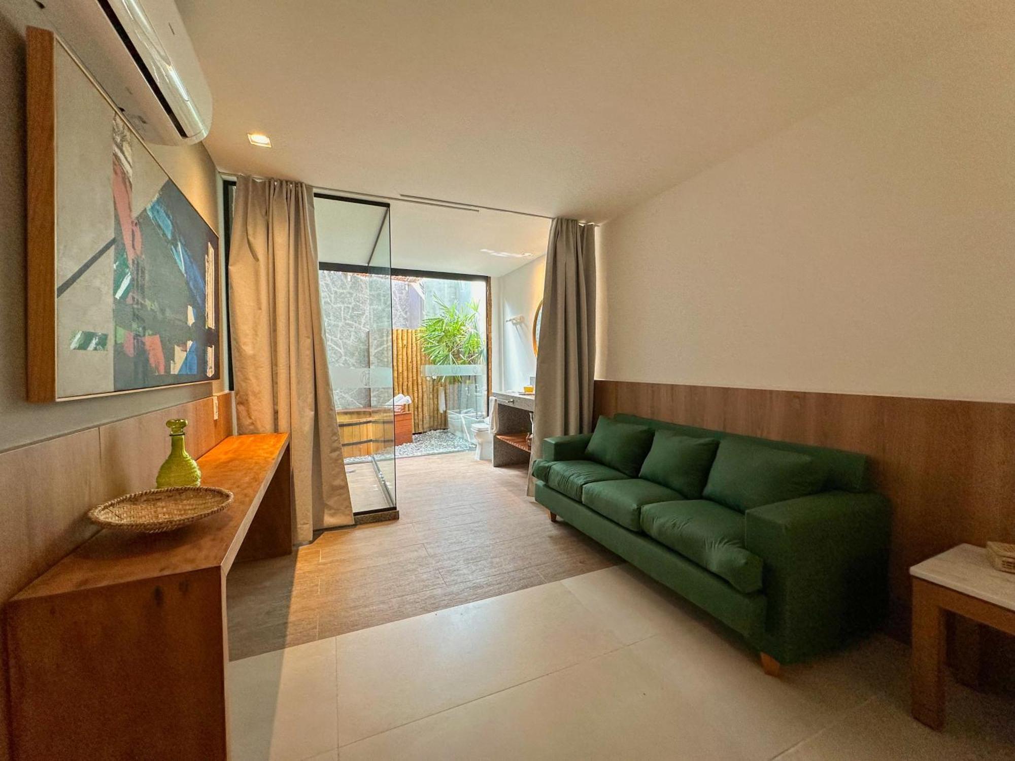 Passagem Concept Hotel E Spa กาโบฟรีโอ ภายนอก รูปภาพ A living room in a micro apartment in Beijing, China